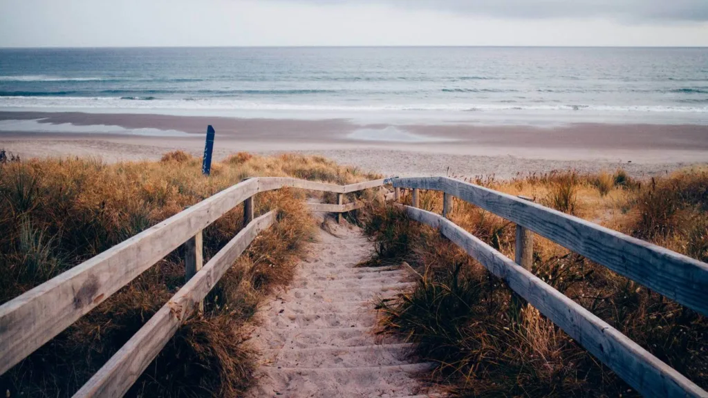 View of path down to beach in mount maunganui